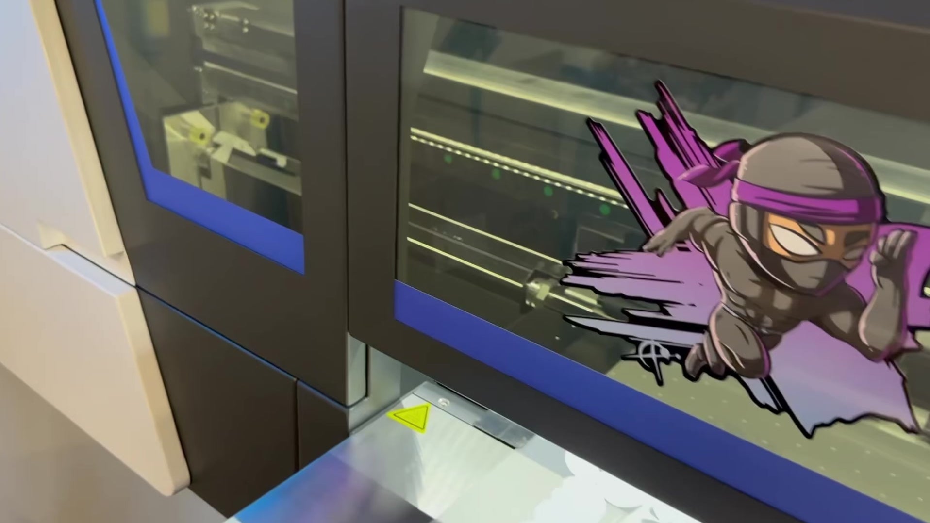 Load video: Shinobi Transfers printing high-quality DTF gang sheets in New Zealand with fast turnaround and vibrant colours.