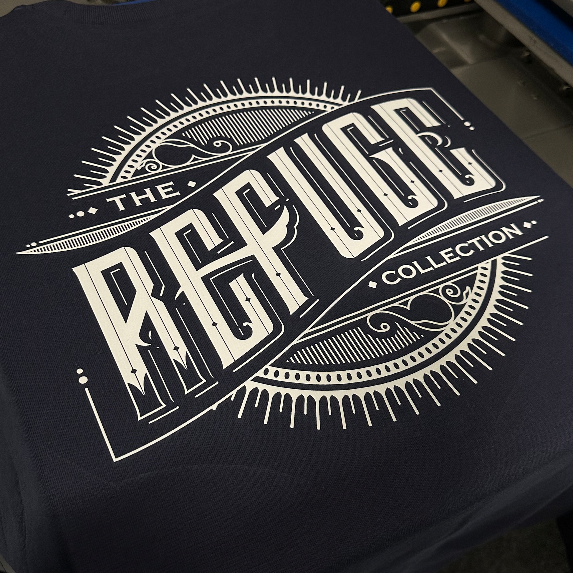 DTF transfer applied on a T-shirt using a heat press, showcasing Shinobi Transfers’ crisp print quality.